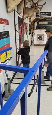 My Grandson shooting his bow