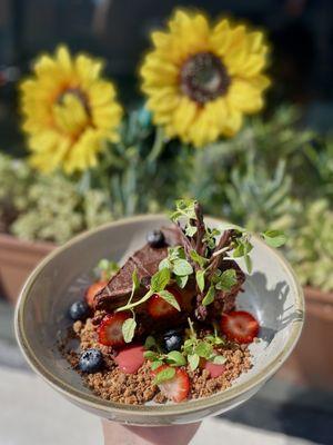 Indulge in culinary perfection: our chef's signature Chocolate Mousse Cake, a decadent delight for your senses.