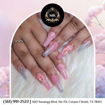 Spring blooms on your fingertips! 
Let your nails blossom with pink floral designs.