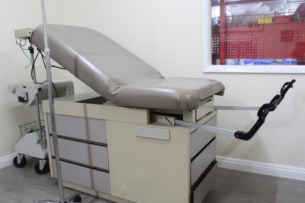 This exam table is available for rent or sale for a medical facility.