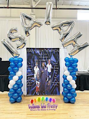 Custom backdrop and balloon arch