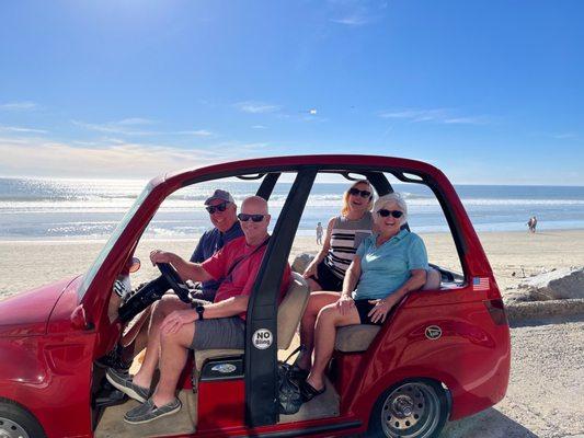 Classic golf cart before North County Auto-body.