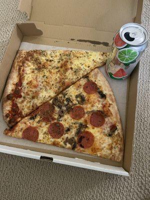 Cheese slice and pepperoni & mushroom slice. Seltzer for scale