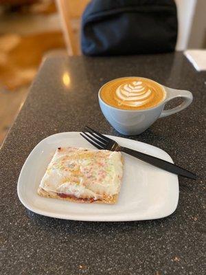 Latte with an extra shot and a strawberry tart. Delish!