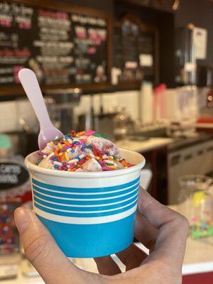 Strawberry kiddie scoop with rainbow sprinkles