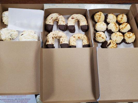 Coconut macaroons,  almond horns, cranberry scones, canoli