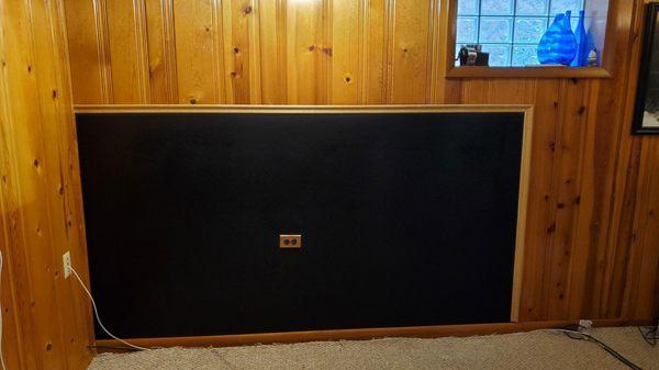 Robert and his partner creatively solved the issue of my "Frankenwall!" Added trim to blend the 2 surfaces and used chalkboard paint.