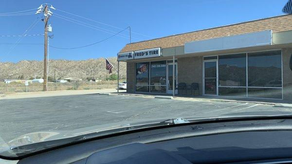 Fred's Tires. It's non-descript but you get friendly and professional service by a family owned small business.