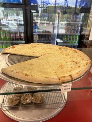 Slices are large (White Pie ready to be heated and sold by slice)