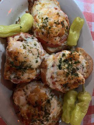 Cajun shrimp toast--bread, cheese, shrimp, tomatoes