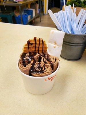 Chocolate ice cream with chocolate sauce, waffle chip and marshmallow