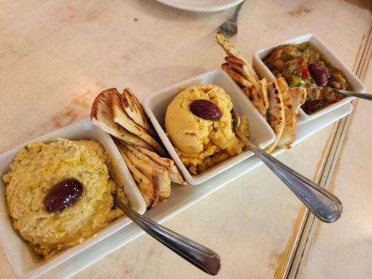 Hummus, fava, and melitzanosalata spreads