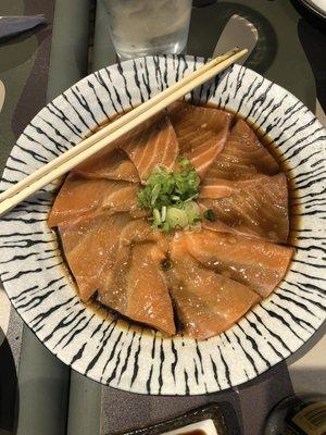 Salmon Carpaccio with garlic soy, truffle oil, and sea salt.