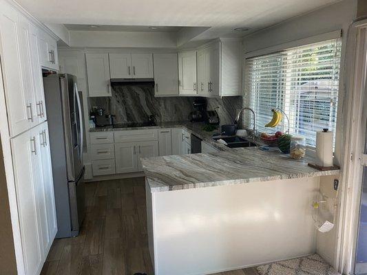 Fully remodeled by lifetime flooring. Floors, countertop and cabinets.