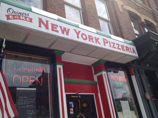 What see before you walk into the new York pizzeria