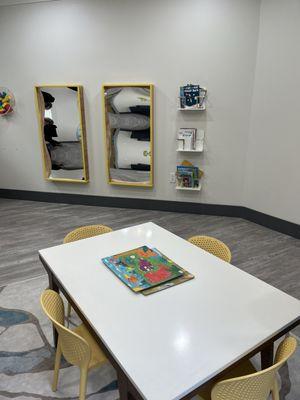 Nice clean waiting room with puzzles , toys, and books.