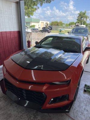 5th gen Camaro changed to 6th gen front end and painted. Carbon fiber hood, roof painted black and other goodies!