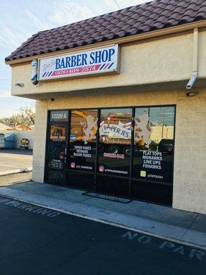 The outside of the shop. You won't regret making this your go to barbershop