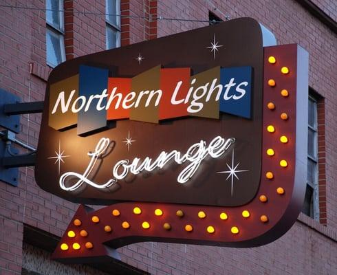 Great Lakes cities have great lounges. Wooden back bar, nostalgic lighting old buildings.