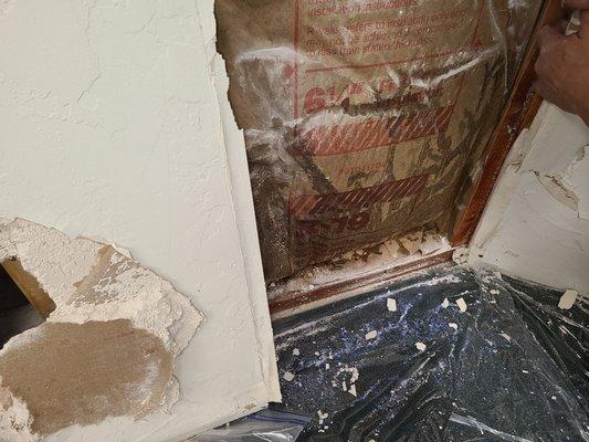 Behind the drywall, water starts wicking up to 2 feet