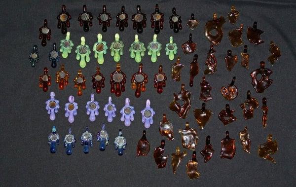 Honey comb drip pendants and shatter pendants in several different colors.