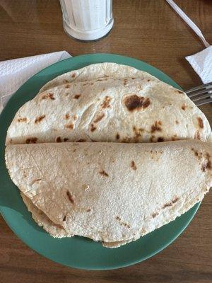 Corn tortilla with chicharron in salsa. Delish! And bean and bacon in flour tortilla.