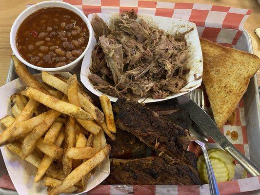 Pick two platter for $25.... Pulled pork, 3 piece rib choice 2 sides, also garlic toast & pickle chips.