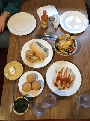 Vegan Philly cheez steak, wrap, greens, corn muffins and nachos. All so good!