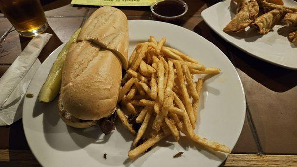 Tucson cheese steak sandwich with shoestring fries