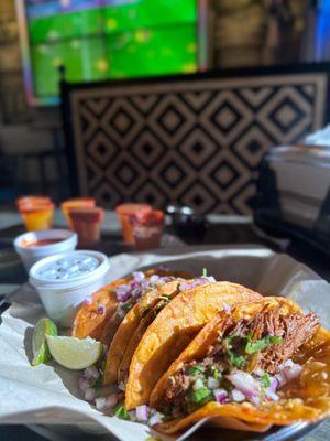 4 birria taco with consomé plate