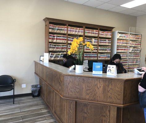 A couple of members of our hardworking and caring staff in our spacious office.