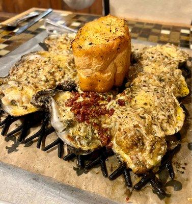 Trio oysters :  creamy lump crab meat Creamed spinach and house-made bacon Seafood etouffee sauce