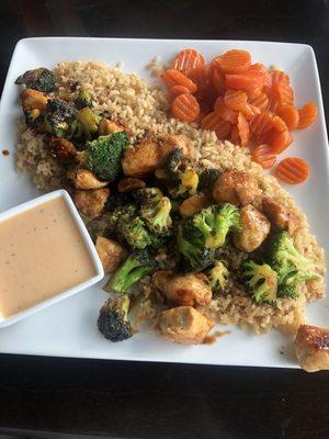 Hibachi chicken with fried rice and sweet carrots