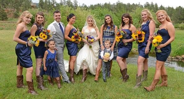 All the girls and bridesman with their flowers. Photo by Custom Creations