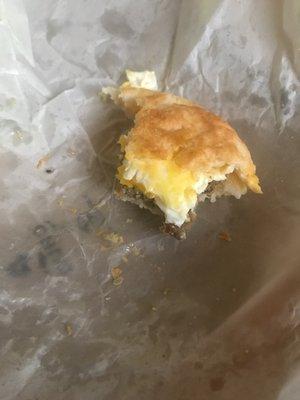 Turkey sausage, egg and cheese biscuit. What's left of it. ‍