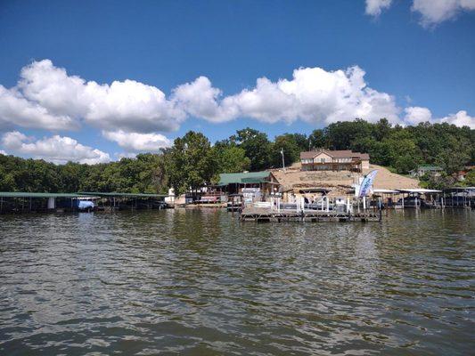 BuckNaked Restaurant Bar & Marina right on the Lake of the Ozarks with a large, covered
 deck overlooking the lake.