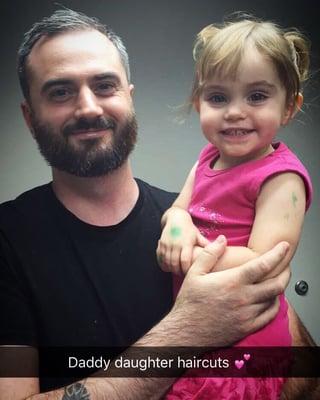 My husband and daughter after their hair cuts