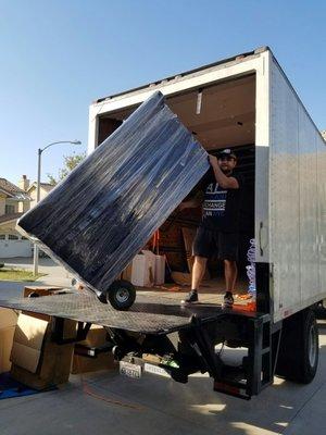 Sam and huge heavy dresser.