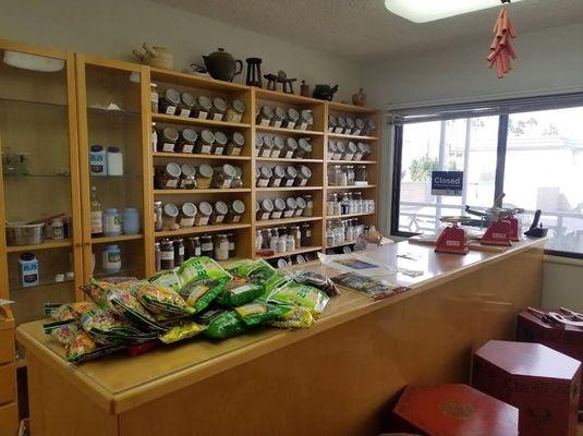 A display cabinet of Chinese herbal medicines.