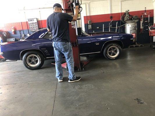 1969 Camaro on the lift at Victors Automotive.