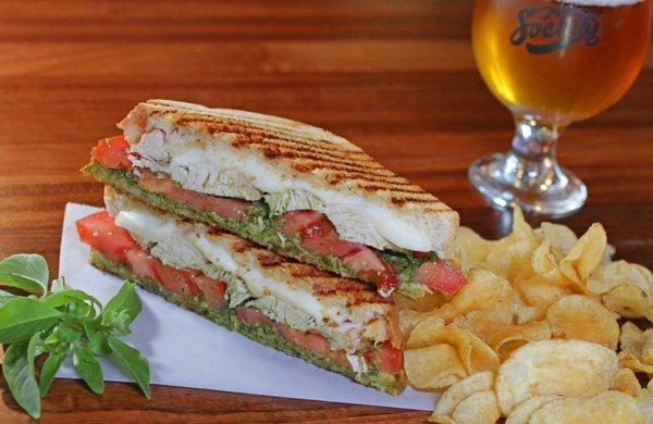 Chicken pesto panini with mozzarella and tomatoes