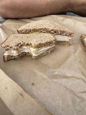 My disgusting ashtray tasting sandwich without any lettuce or tomato on this sad excuse of lunch and today is 8/3.