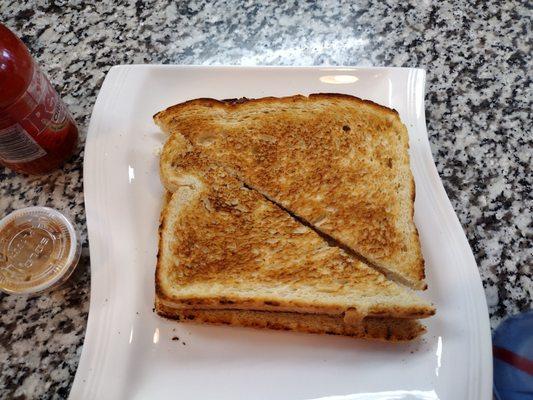 Sourdough toast that came with souvlaki breakfast.