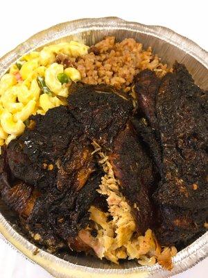 Jerk chicken with macaroni salad and spinach rice. 9/5/16