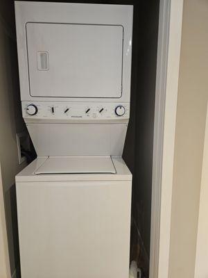 Energy efficient full size washer and dryer tucked into #3 closet in the studio.