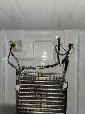 Repair of a refrigerant leak in the refrigerator."