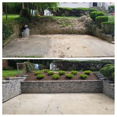 Replacement wall and new landscaping.