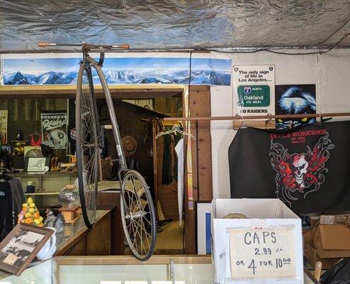 Penny-farthing bike right at entrance. Les put tinfoil to decorate ceiling and it's help up for 50+ years.