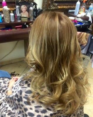 Touch up and haircut. Darker blonde on top and highlights on the bottom. Semi-ombre look. Love it