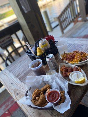 Fried calamari, loaded fries and bacon wrapped